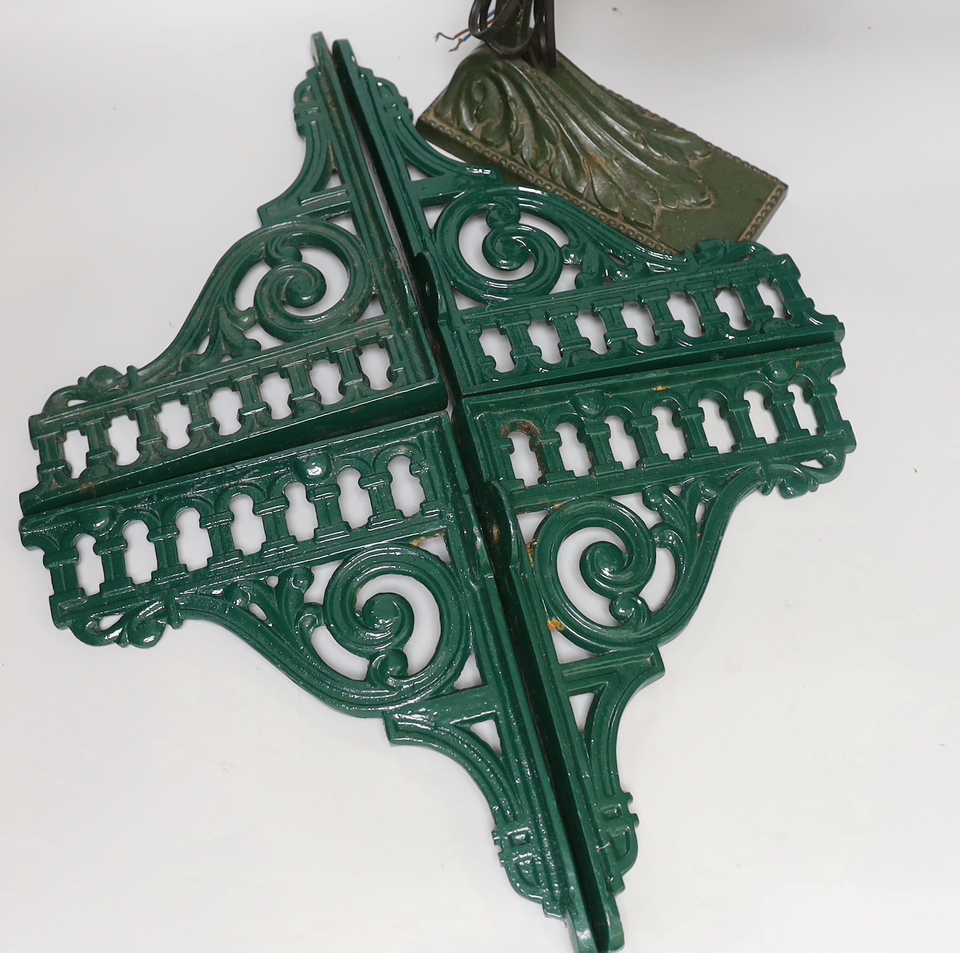 A student's lamp and four painted cast iron wall brackets